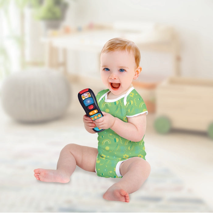 VTech - Télécommande Lumi-Magique, Télécommande TV Bébé Qui Change de Couleur, Jouet Musical et Éducatif, Effets Lumineux, Cadeau Bébé Dès 9 Mois - Contenu en Français VTech - Télécommande Lumi-Magique, Télécommande TV Bébé Qui Change de Couleur, Jouet Musical et Éducatif, Effets Lumineux, Cadeau Bébé Dès 9 Mois - Contenu en Français